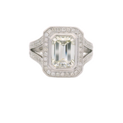 ROYAL GEMS - BEZEL SET EMERALD WITH HALO AND DIAMOND SPLIT SHANK DIAMOND RING