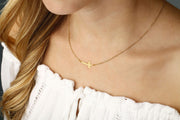 SIDEWAYS CROSS NECKLACE