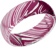 Woodgrain Damascus steel 8mm domed band beveled edges and pink Cerakote in the recessed pattern