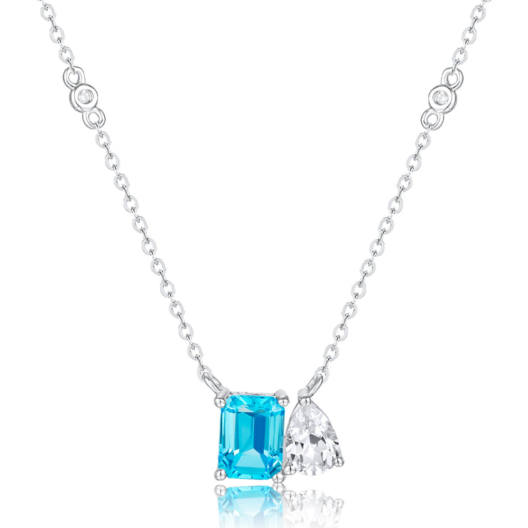 LUVENTE - BLUE TOPAZ & WHITE TOPAZ PENDANT